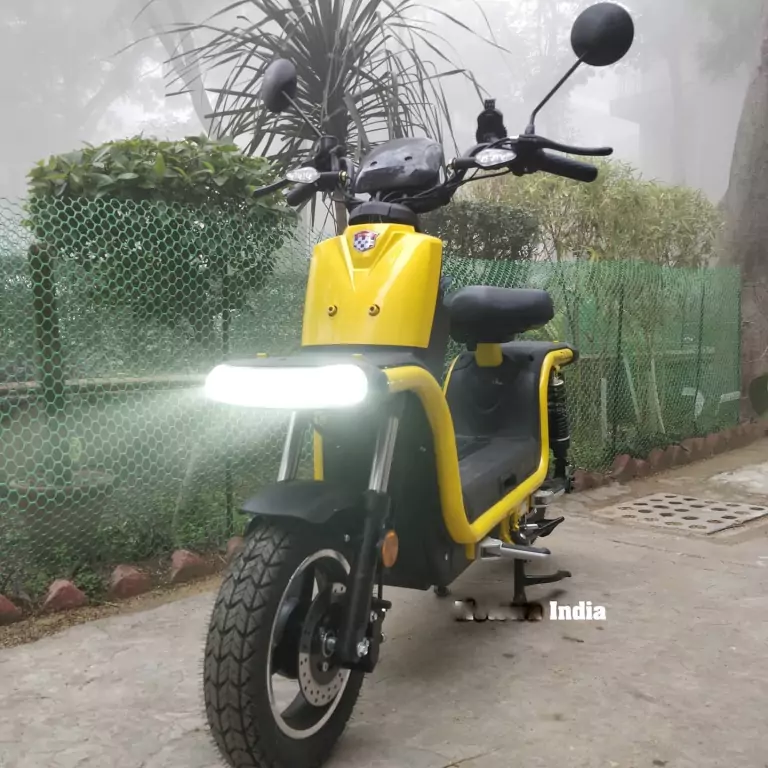Okinawa Dual 100, Yellow Color, front view with headlight on